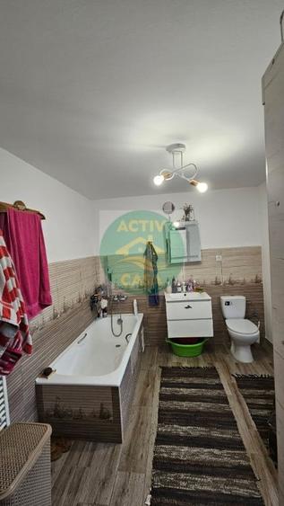 Casă cu 4 camere cu Teren 500 Mp în Central