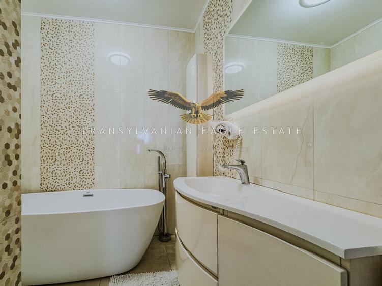 Apartament cu 3 camere semidecomandat, mobilat în Central