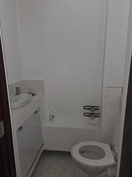 Apartament cu 5 camere decomandat în P-ța Romană