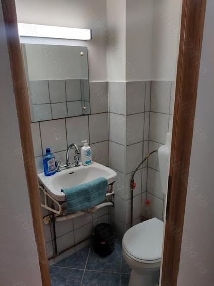 Apartament cu 3 camere decomandat în Tractorul
