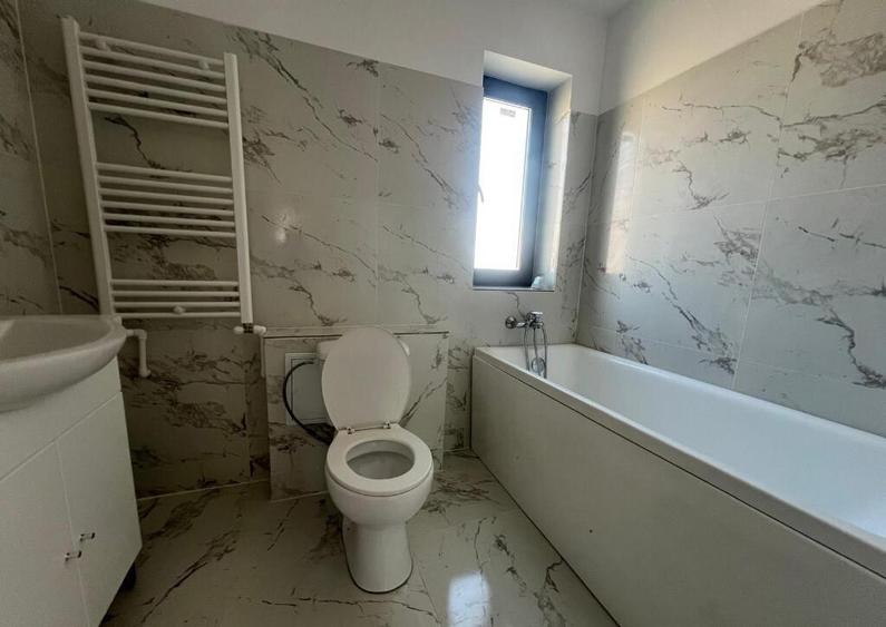 Casa tip duplex - 3 camere - 2 bai - teren 210 mp - 5