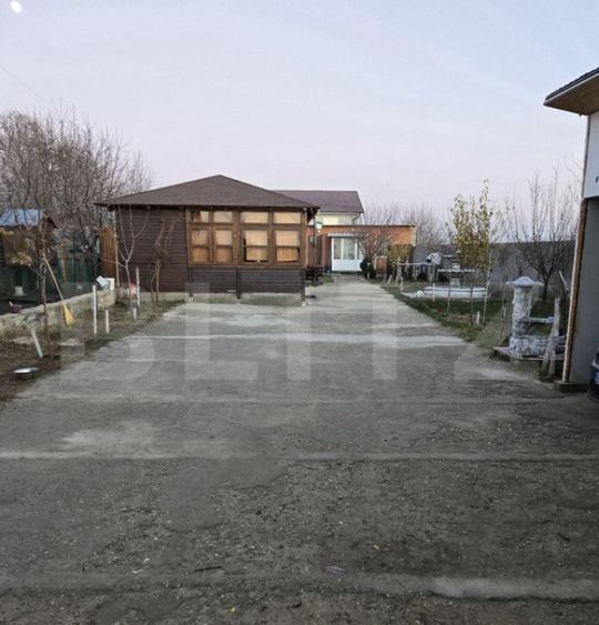 Casa parter 100 mp utili, teren 880 mp, toate utilitatile, C - 1