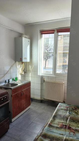 Apartament -central de vanzare Roman - 2