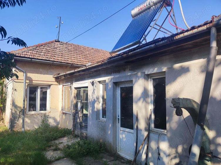 Vand sau schimb casa la curte comuna - 9