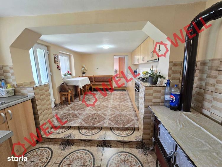 Casă cu Teren 1493 Mp în Ozun