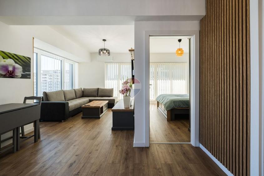 Apartament cu 2 camere decomandat, mobilat în Tractorul