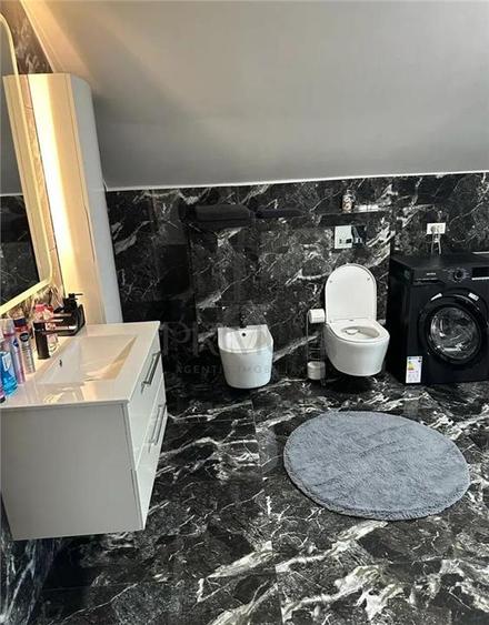 Casa individuala - teren 1000 mp - garaj - 9