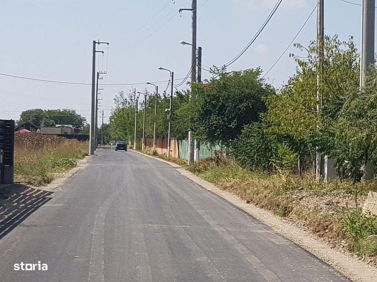 Vanzare teren langa padure,drum amenajat,case noi ,620 mp,26500 E - 3