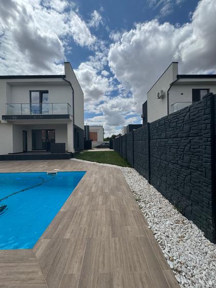 Casa individuala - Com. Berceni - Teren 450 mp - Matrimonial cu dressing si baie - 1