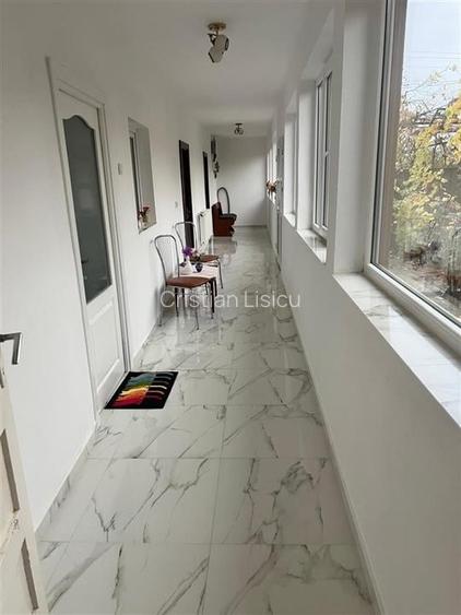 Casa individuala de caramida cu centrala pe gaz Parta