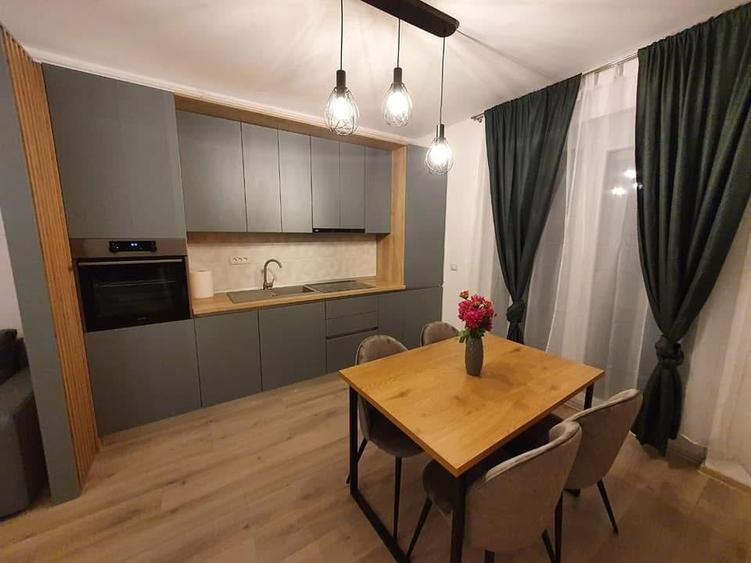 De închiriat  apartament modern  cu 2 camere, grădină proprie - 1