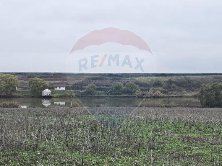 DE VANZARE LAC Pescuit sportiv 6,7ha + TEREN 6,3ha - 9
