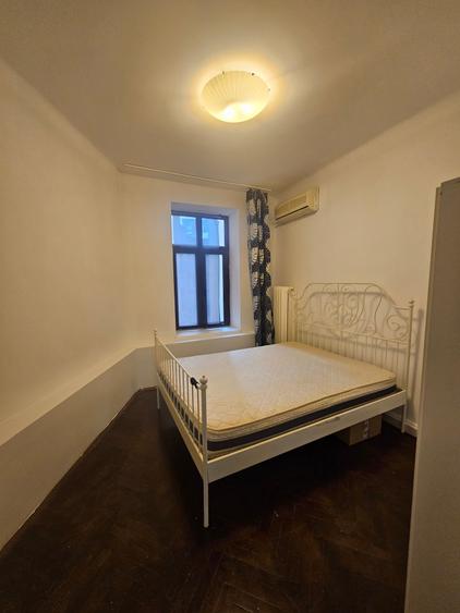 Apartament cu 4 camere decomandat în Calea Victoriei
