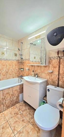 Apartament cu 3 camere decomandat, mobilat în Rahova