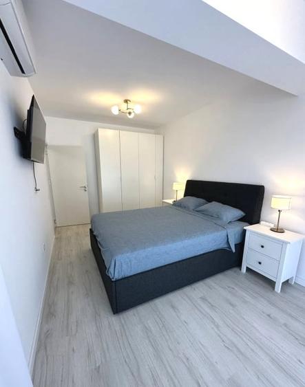 Apartament cu 3 camere semidecomandat, mobilat în Otopeni