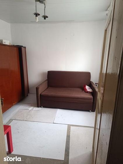 Casă cu 2 camere cu Teren 90 Mp în Bucu
