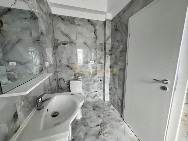 Casa individuala - 82 mp utili + terasa 13 mp - Teren- 380 mp - 13