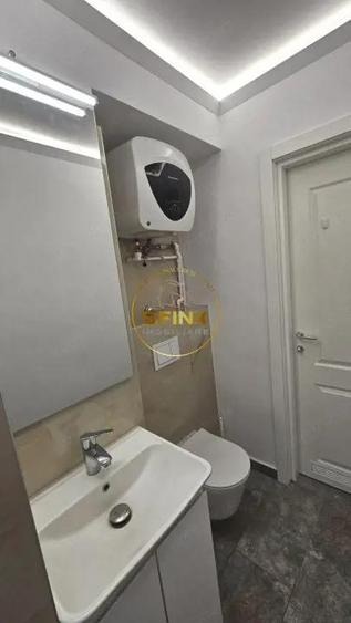 Garsoniera renovata Piata Alba Iulia bloc 93 - 8