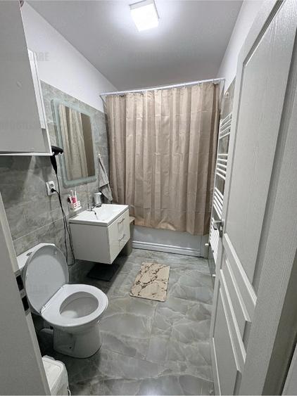 Apartament 2 camere - decomandat - mobilat si utilat - curte - 130.000 euro - 3