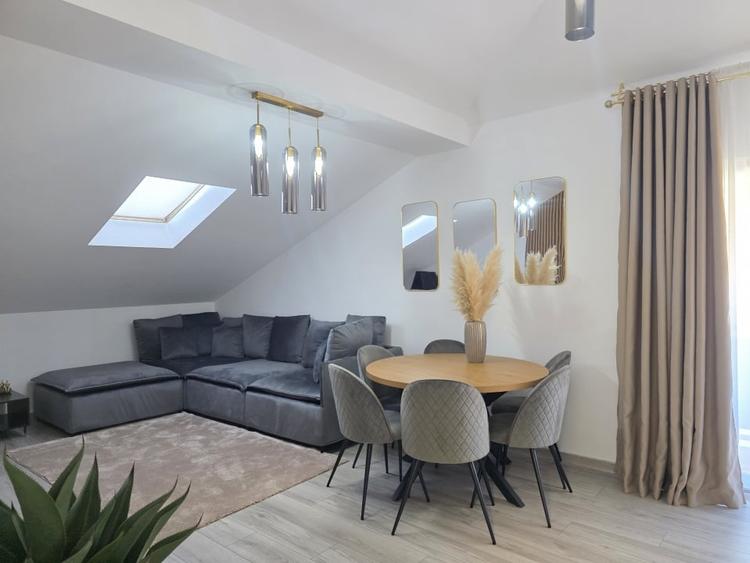 Apartament cu trei camere pe doua niveluri, tip vila, zona Tractorul - 2