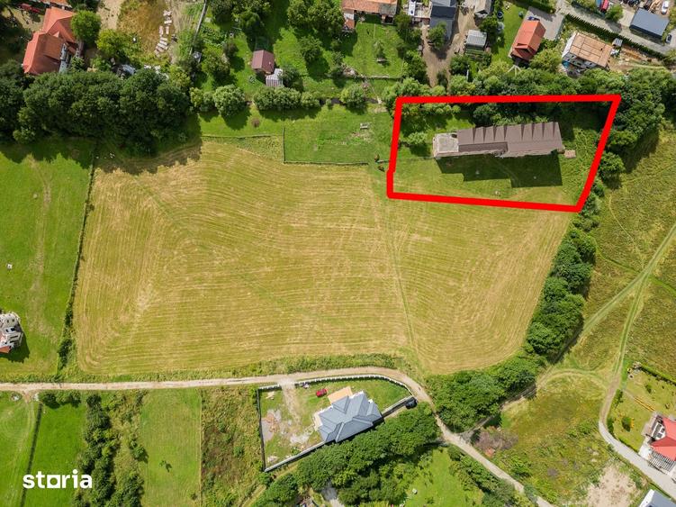 Casă cu Teren 2000 Mp în Central
