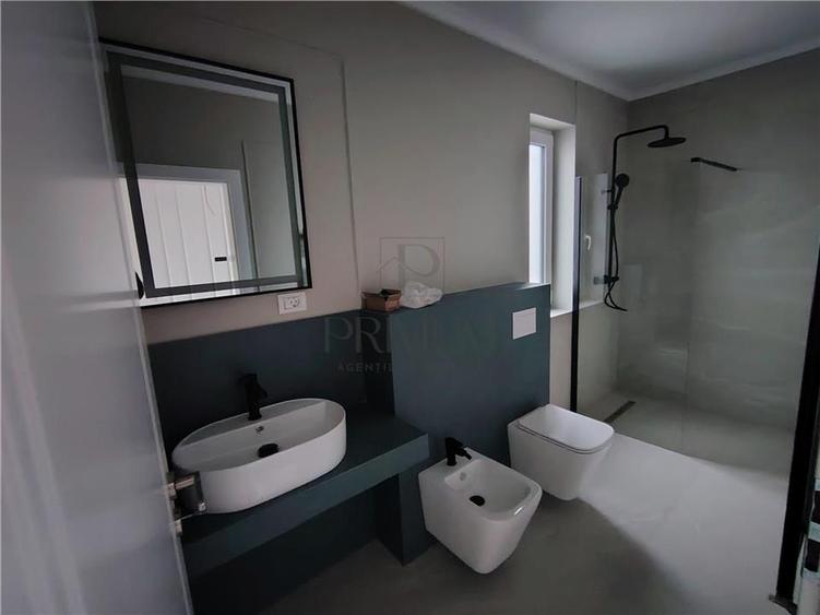 Casa individuala - zona superba - teren 522 mp- toate utilitatile - carport. - 14