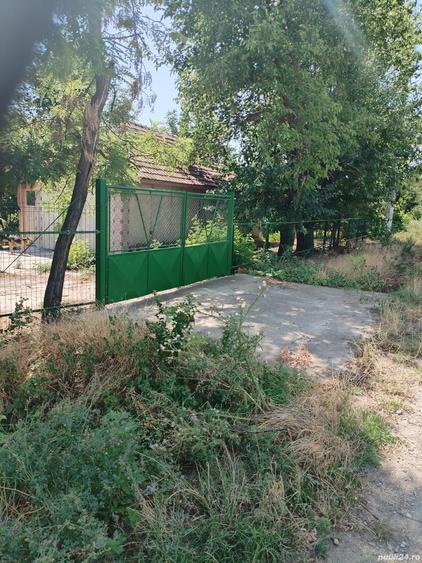 Teren cu doua corpuri casa - 35500 eur - 3