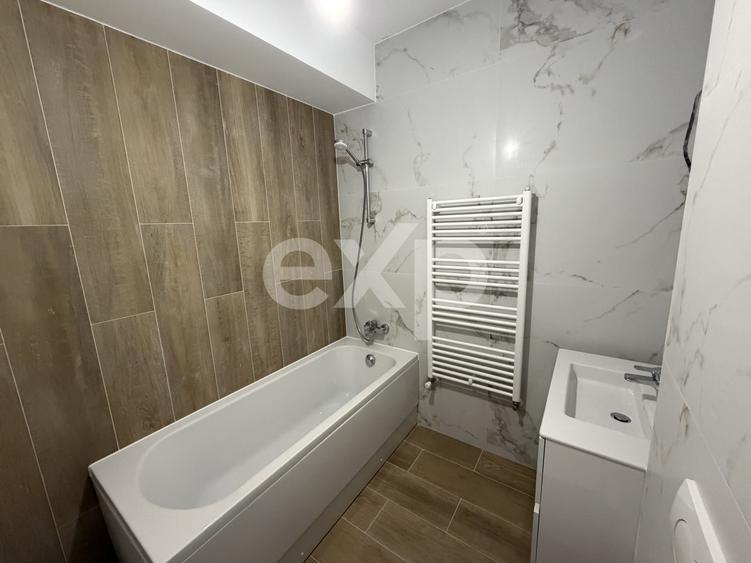 Apartament cu 2 camere decomandat în Tractorul