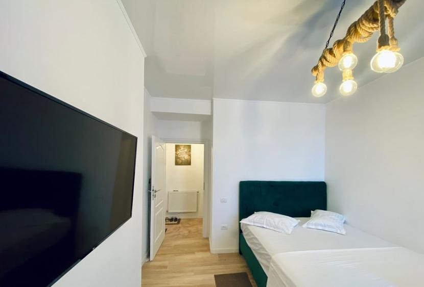 Apartament cu 2 camere semidecomandat, mobilat în Central