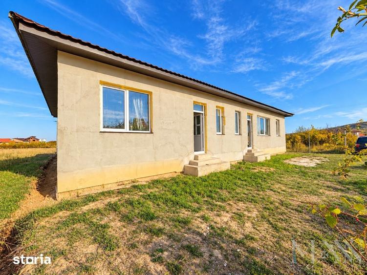 Casă cu 4 camere cu Teren 553 Mp în Sânmartin