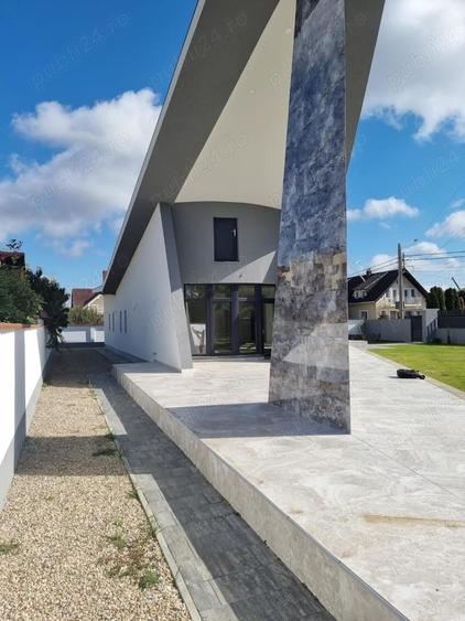 Casă cu 4 camere cu Teren 1000 Mp în Sânmartin