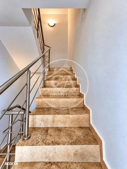 Apartament cu 5 camere decomandat în Sânmartin