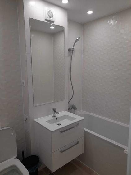 Apartament cu 2 camere semidecomandat în Cățelu