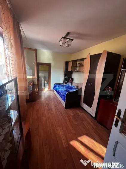 Casă cu 4 camere cu Teren 100 Mp în Central