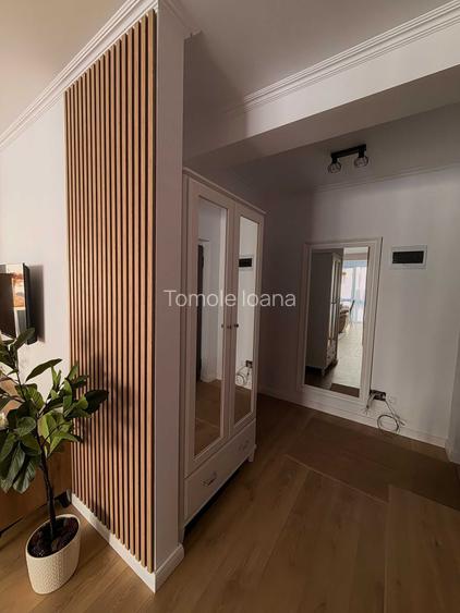 Inchiriez apartament 2 camere si living open space in bloc nou