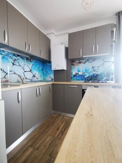 Apartament cu 3 camere decomandat, mobilat în Borhanci