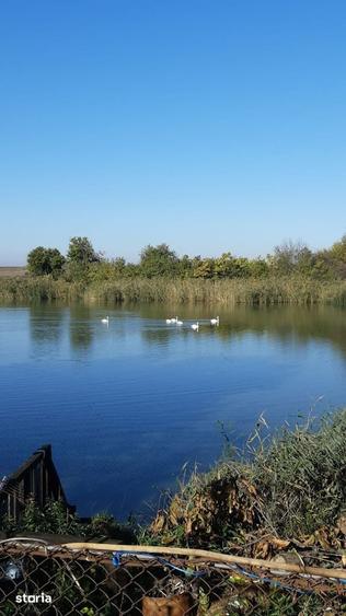 Teren intravilan 4300mp cu deschidere la lac din curte. - 5