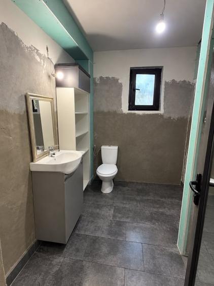 Casă individuală cu 4 camere cu Canalizare în Bucov