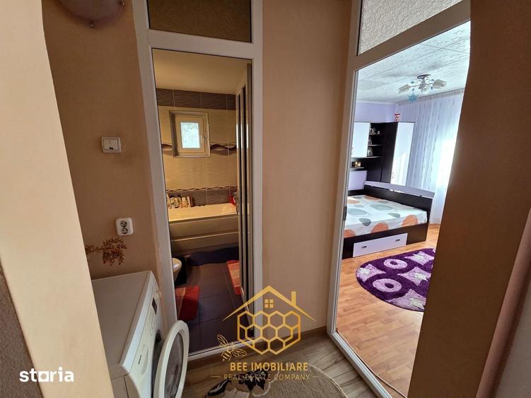 Apartament cu 3 camere in zona centrala - Filiasi - 11