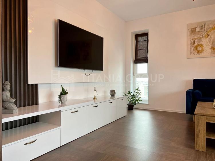 Apartament cu 2 camere semidecomandat, mobilat în Tractorul