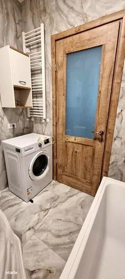 Apartament cu 2 camere semidecomandat, mobilat în Regie