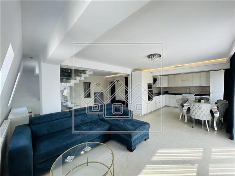 Ap pe 2 niveluri, 75 mp utili + 2 balcoane, mobilat modern - 2