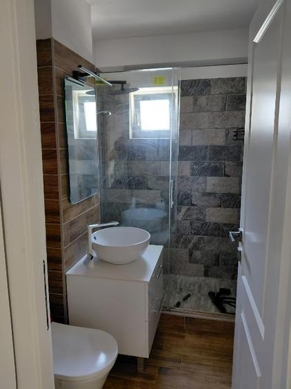 Apartament cu 2 camere semidecomandat, mobilat în Central
