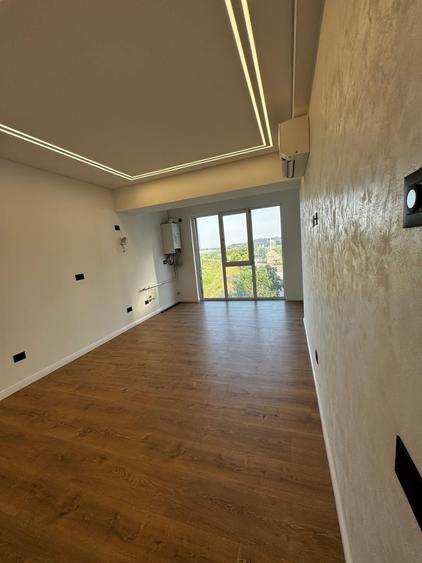 Apartament cu 3 camere decomandat în Sud