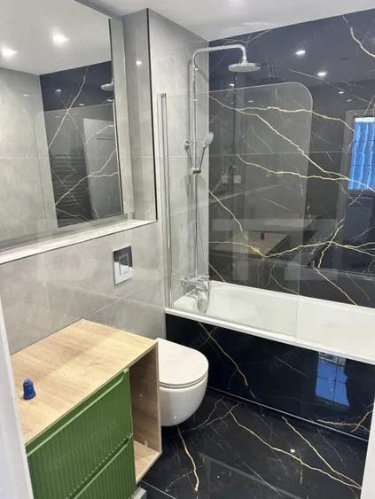 Apartament cu 2 camere semidecomandat, mobilat în Central
