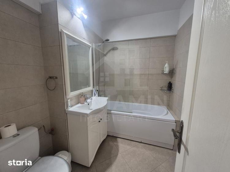 Apartament cu 3 camere decomandat în Calea București