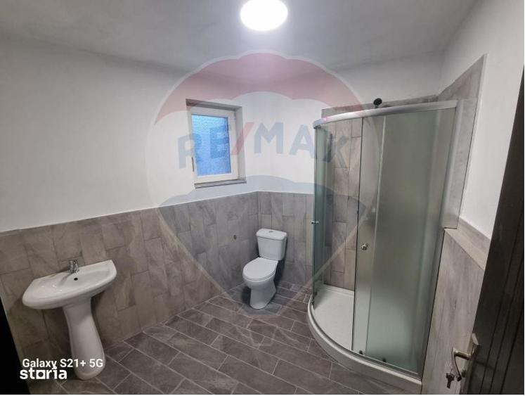 Casă cu 4 camere cu Teren 300 Mp în Central