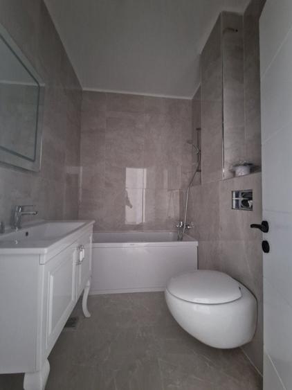 Decebal - Unirii -  Bloc nou - Apartament 3 camere - terasa - 2 grupuri sanitare - 18