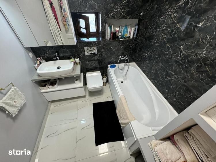 Casă cu 4 camere cu Teren 400 Mp în Podari