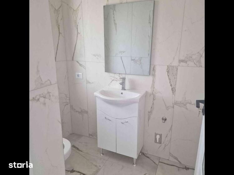 Casă cu 4 camere cu Teren 500 Mp în Central